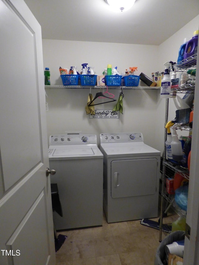 clothes washing area featuring laundry area and independent washer and dryer