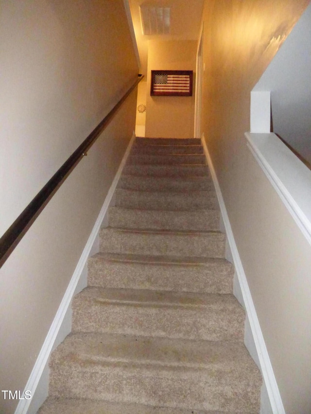 staircase with baseboards