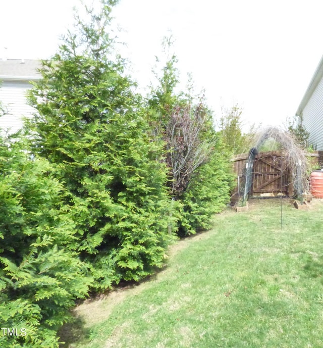 view of yard with fence