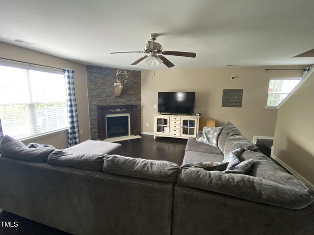 401 Lawton Dr, Haw River, NC 27258 - living room with a ceiling fan, a fireplace, baseboards, and wood finished floors
