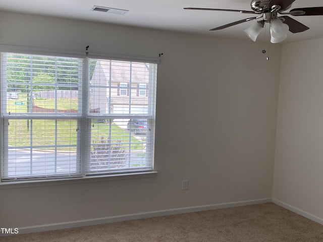 401 Lawton Dr, Haw River, NC 27258 - spare room featuring carpet floors, healthy amount of natural light, and baseboards
