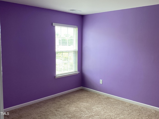 401 Lawton Dr, Haw River, NC 27258 - unfurnished room with plenty of natural light, carpet, and baseboards