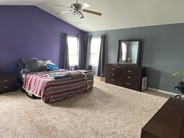 401 Lawton Dr, Haw River, NC 27258 - carpeted bedroom featuring vaulted ceiling, a ceiling fan, and baseboards