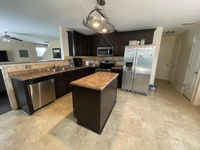 401 Lawton Dr, Haw River, NC 27258 - kitchen with stainless steel appliances, a sink, tasteful backsplash, and a ceiling fan