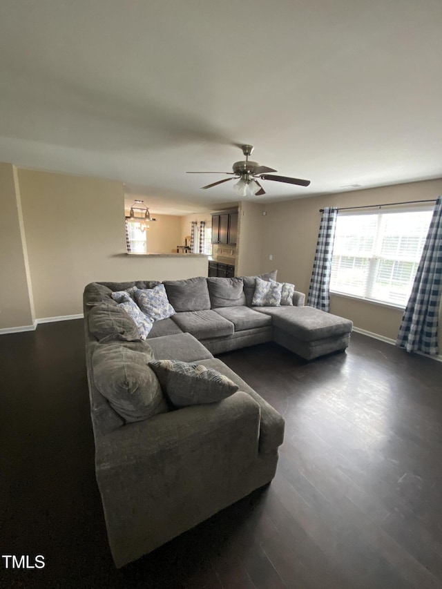 401 Lawton Dr, Haw River, NC 27258 - living area featuring baseboards, a ceiling fan, and wood finished floors