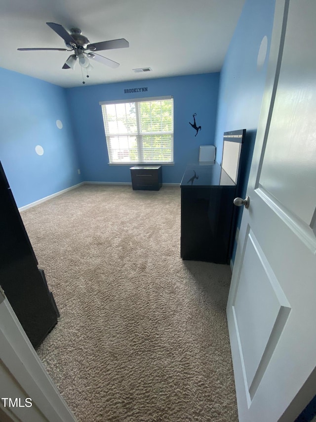 401 Lawton Dr, Haw River, NC 27258 - home office featuring carpet, a ceiling fan, and baseboards