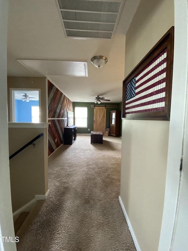 401 Lawton Dr, Haw River, NC 27258 - hall with attic access, carpet flooring, an upstairs landing, and baseboards