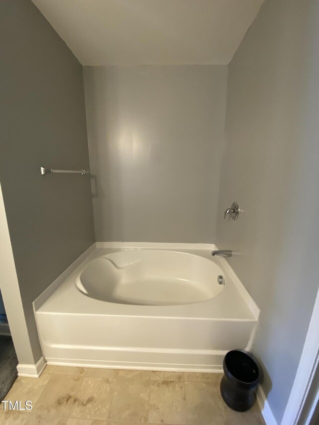 401 Lawton Dr, Haw River, NC 27258 - full bathroom featuring a bath and baseboards