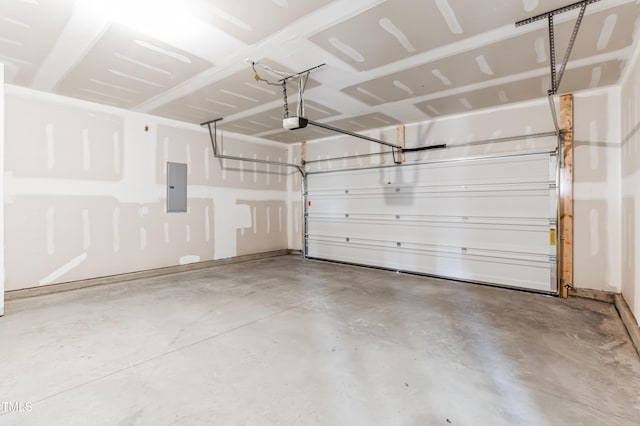 garage featuring electric panel and a garage door opener