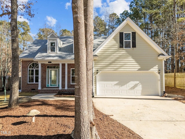 view of front of property featuring a garage