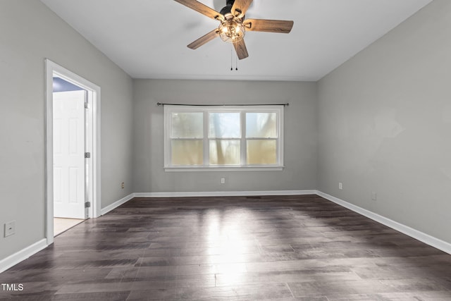 unfurnished room featuring ceiling fan and dark hardwood / wood-style floors