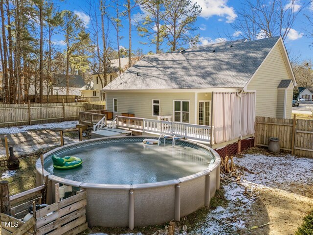 view of pool with a deck