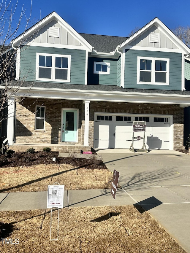 craftsman house featuring a porch and a garage