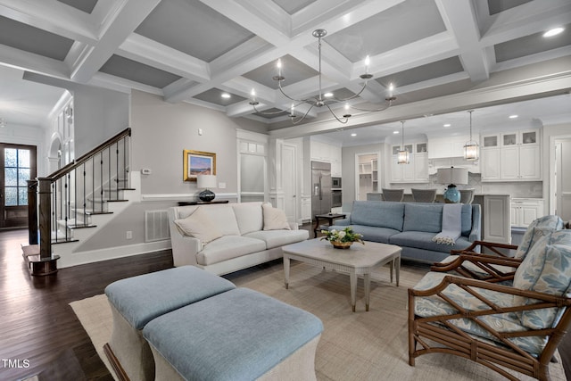 living room featuring wood-type flooring, beamed ceiling, and coffered ceiling