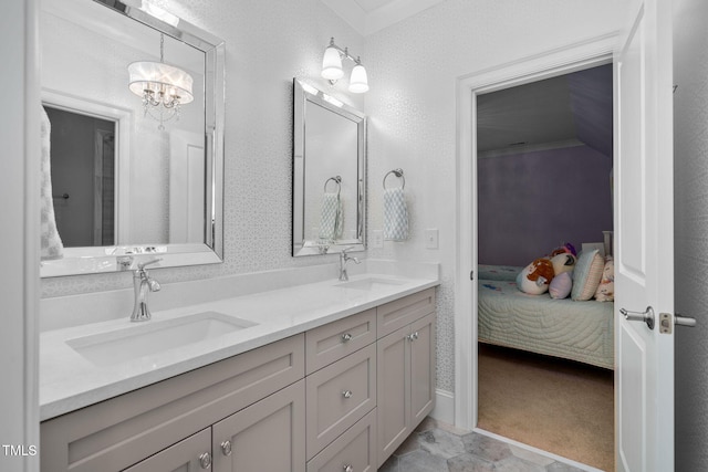 bathroom featuring vanity and an inviting chandelier