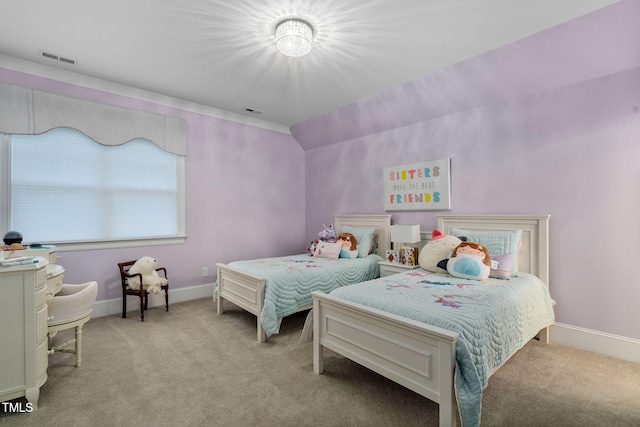 bedroom featuring light carpet and vaulted ceiling