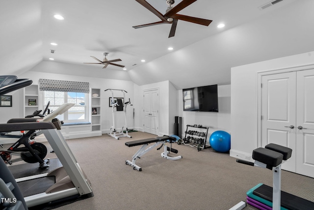 exercise area with ceiling fan, carpet floors, and lofted ceiling