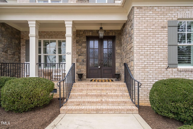 entrance to property featuring french doors