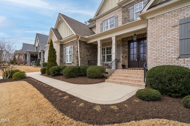 property entrance with french doors and a porch