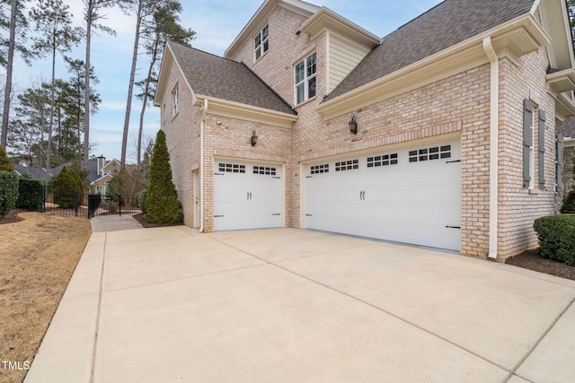 view of property exterior featuring a garage