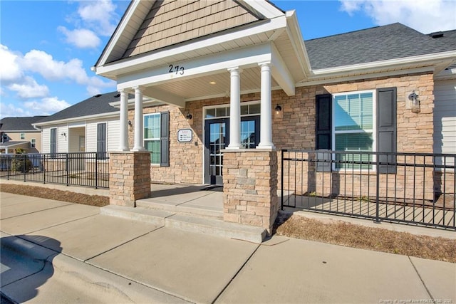 property entrance with covered porch