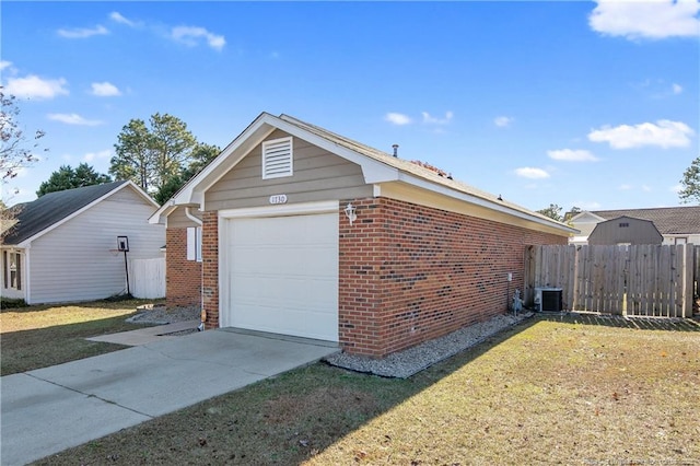 view of property exterior with a garage, cooling unit, and a yard