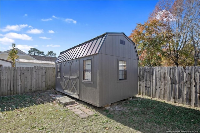 view of outdoor structure featuring a yard