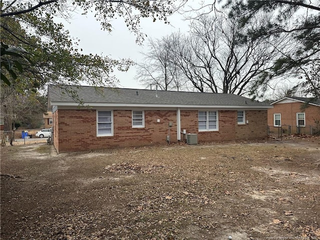 rear view of house with central AC