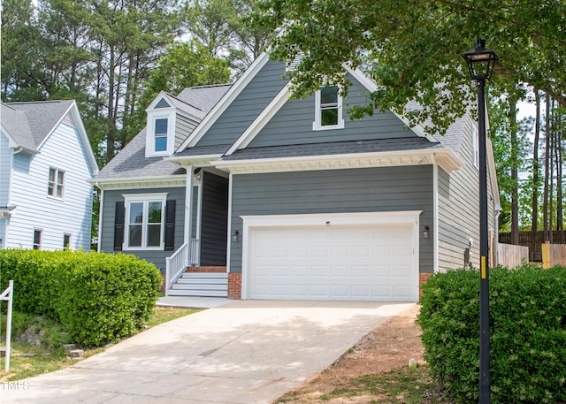 view of front of property with a garage