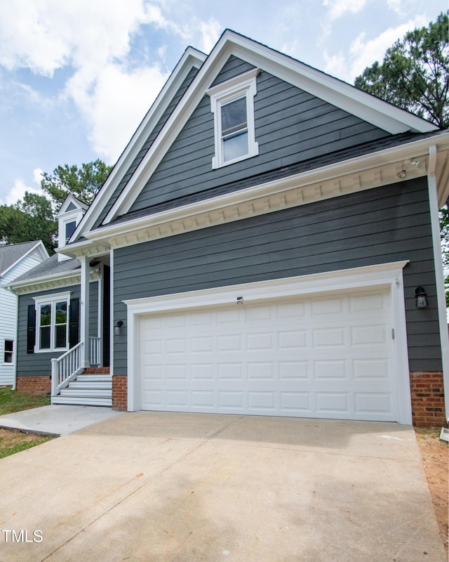 craftsman house featuring a garage