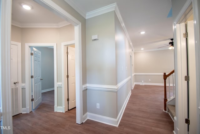 hall featuring wood-type flooring and ornamental molding