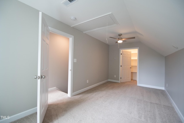 bonus room featuring ceiling fan, light colored carpet, and vaulted ceiling