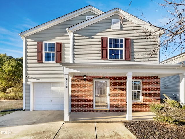 view of front of property with a garage