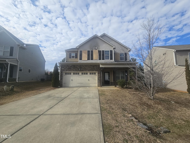 front of property featuring a porch and a garage