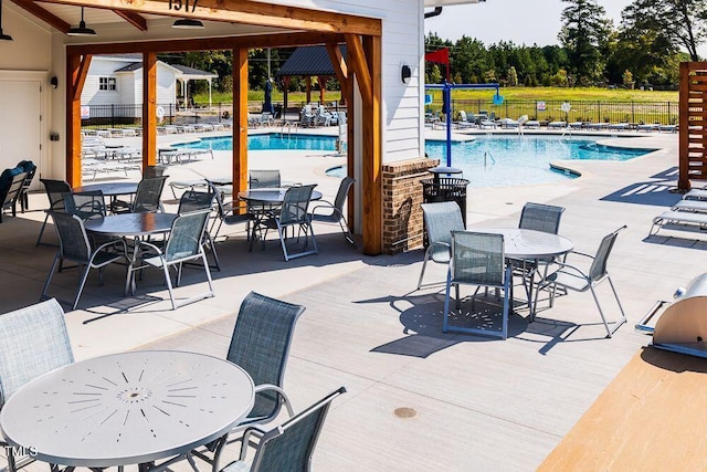 view of swimming pool with a patio