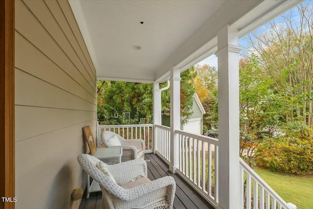 balcony featuring a porch