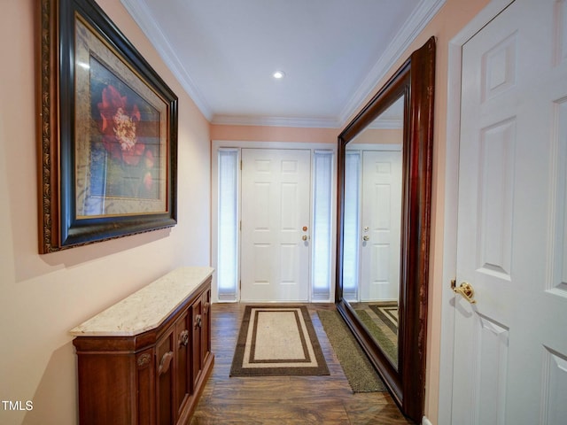 entryway with dark hardwood / wood-style flooring and crown molding