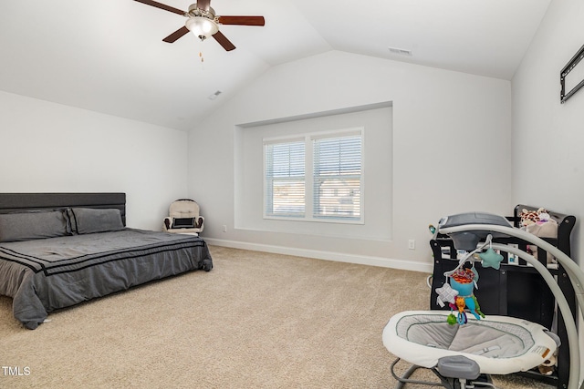 carpeted bedroom with lofted ceiling and ceiling fan