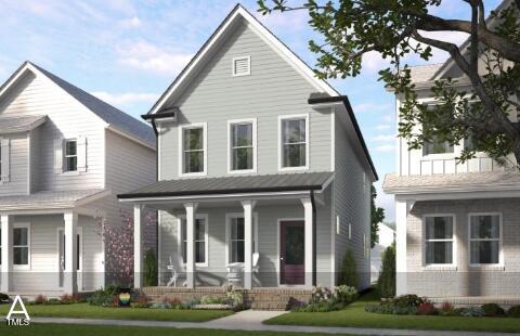 view of front property featuring a front yard and covered porch