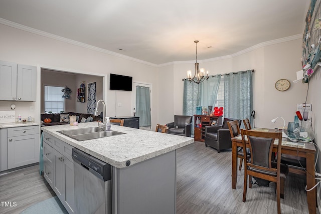 kitchen with sink, gray cabinetry, an island with sink, and dishwasher