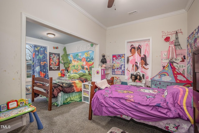 carpeted bedroom with ceiling fan and ornamental molding