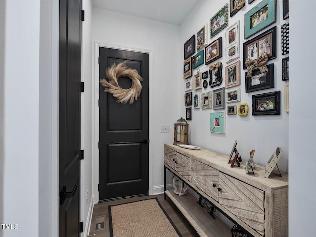 doorway to outside featuring hardwood / wood-style flooring