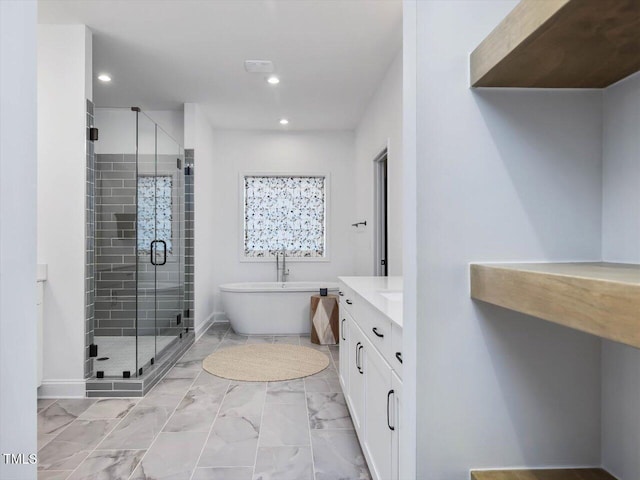 bathroom featuring independent shower and bath and vanity