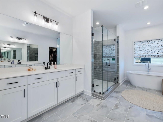 bathroom with plus walk in shower and vanity