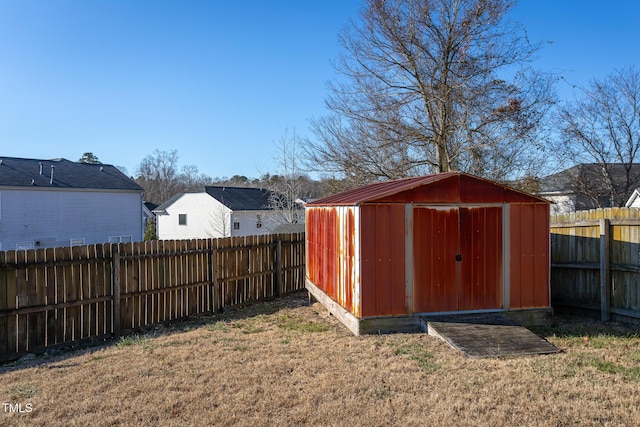 view of outbuilding with a lawn