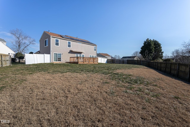 view of yard with a deck