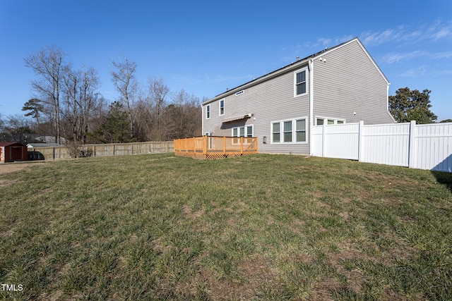 view of yard with a wooden deck