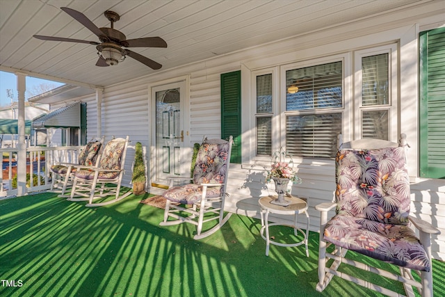 view of patio with a porch and ceiling fan