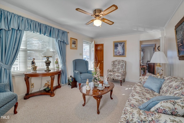 living room featuring ceiling fan, crown molding, carpet, and plenty of natural light