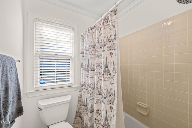 bathroom featuring shower / bath combination with curtain, ornamental molding, and toilet